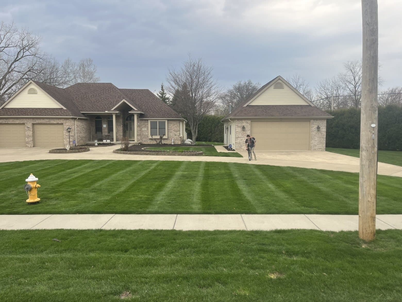 Clean Edge crew completing detailed lawn service